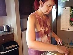 Mature MILF with natural tits gives a tutorial on healthy drinks